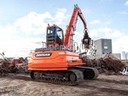 Гусеничный перегружатель Develon DX300MH Doosan 